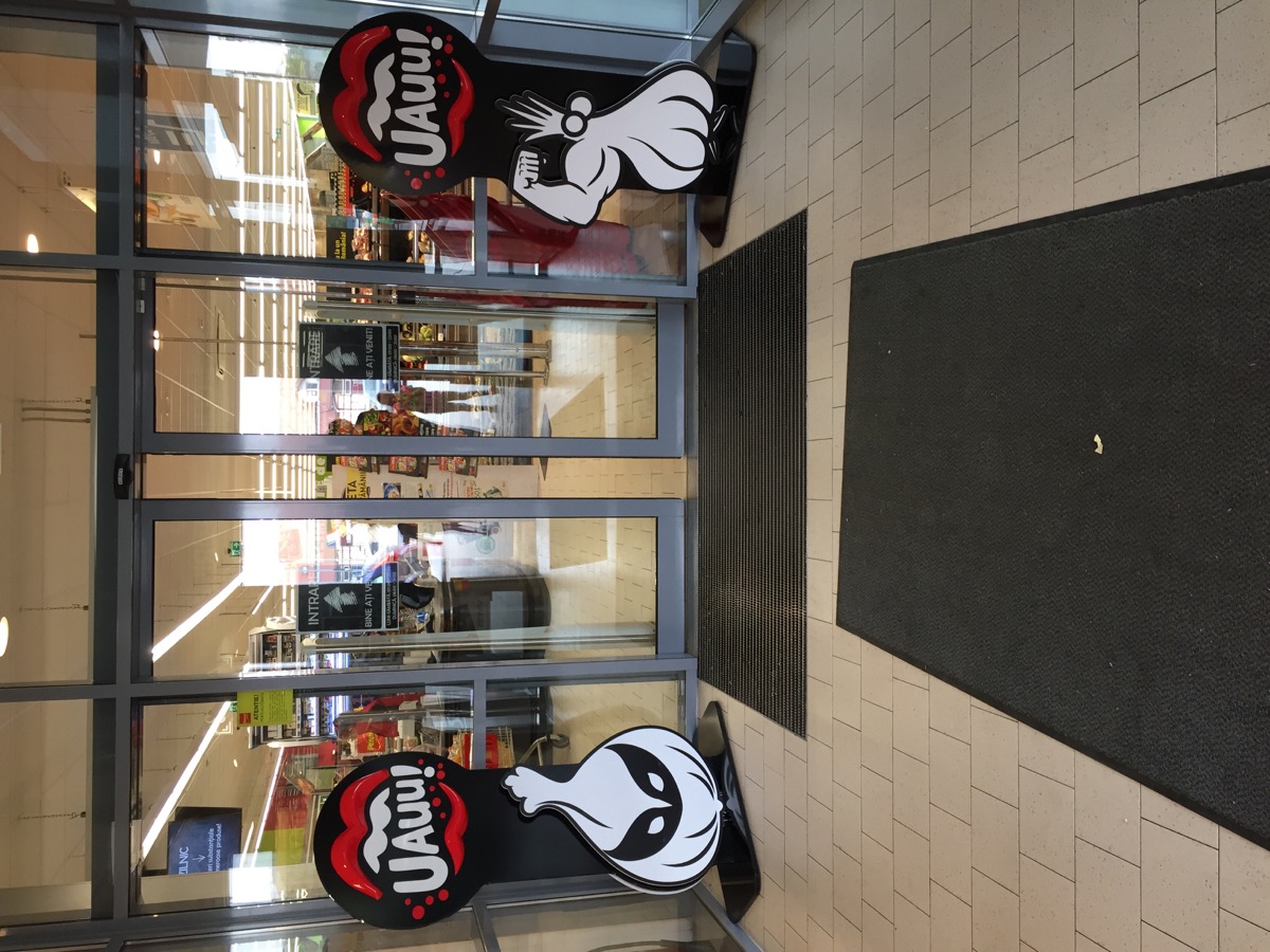 UAUU entrance kit with cutout graphics installed at store entry